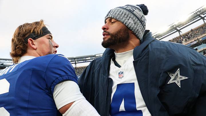 New York Giants quarterback Jaxson Dart greets Dallas Cowboys quarterback Dak Prescott on the field at MetLife Stadium. New York Giants quarterback Jaxson Dart greets Dallas Cowboys quarterback Dak Prescott on the field at MetLife Stadium.