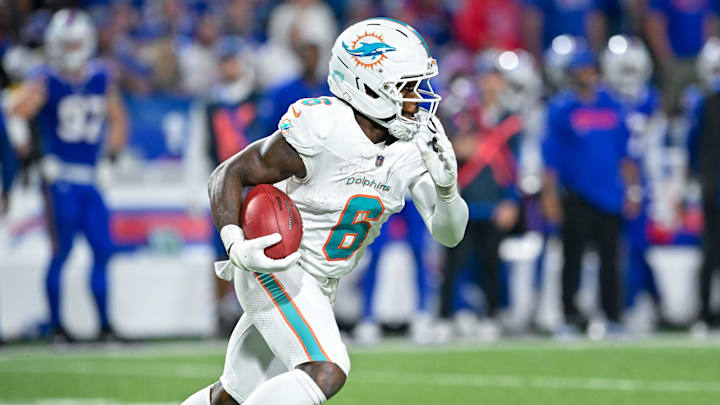 Miami Dolphins wide receiver Malik Washington (6) returns a punt in the third quarter against the Buffalo Bills at Highmark Stadium. Miami Dolphins wide receiver Malik Washington (6) returns a punt in the third quarter against the Buffalo Bills at Highmark Stadium.