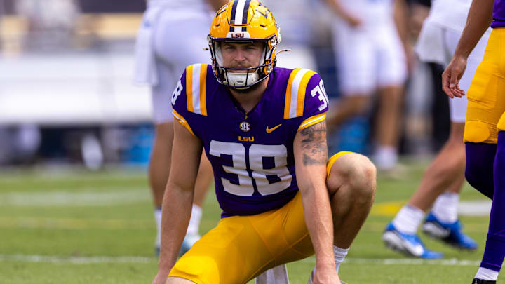 Sep 21, 2024; Baton Rouge, Louisiana, USA; LSU Tigers punter Peyton Todd (38) during warmups before a game against the UCLA Bruins at Tiger Stadium. Mandatory Credit: Stephen Lew-Imagn Images Sep 21, 2024; Baton Rouge, Louisiana, USA; LSU Tigers punter Peyton Todd (38) during warmups before a game against the UCLA Bruins at Tiger Stadium. Mandatory Credit: Stephen Lew-Imagn Images
