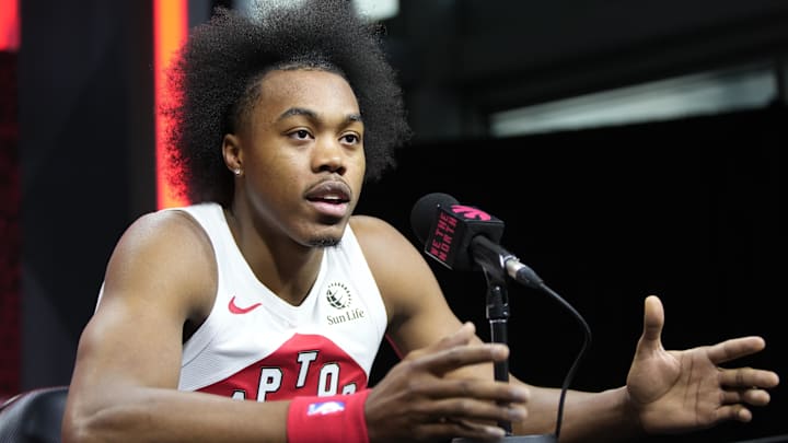 Sep 30, 2024; Toronto, Ontario, Canada; Toronto Raptors forward Scottie Barnes (4) talks to the media during media day at Scotiabank Area. Mandatory Credit: John E. Sokolowski-Imagn Images