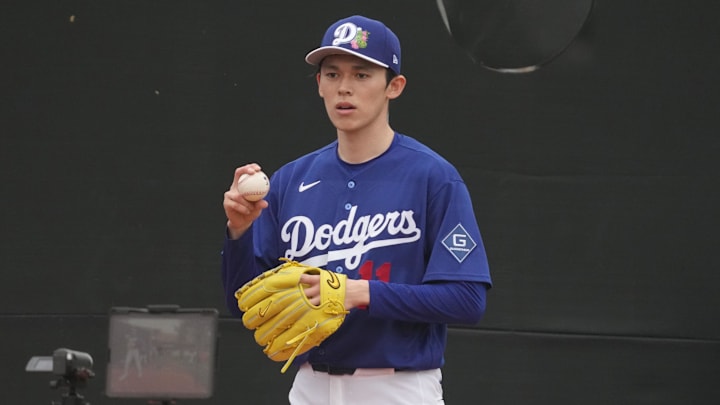 Feb 13, 2026; Glendale, AZ, USA; Los Angeles Dodgers pitcher Roki Sasaki (11) throws in the bullpen during spring training camp. Mandatory Credit: Rick Scuteri-Imagn Images Feb 13, 2026; Glendale, AZ, USA; Los Angeles Dodgers pitcher Roki Sasaki (11) throws in the bullpen during spring training camp. Mandatory Credit: Rick Scuteri-Imagn Images
