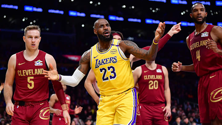 Dec 31, 2024; Los Angeles, California, USA; Los Angeles Lakers forward LeBron James (23) reacts during the first half at Crypto.com Arena. Mandatory Credit: Gary A. Vasquez-Imagn Images