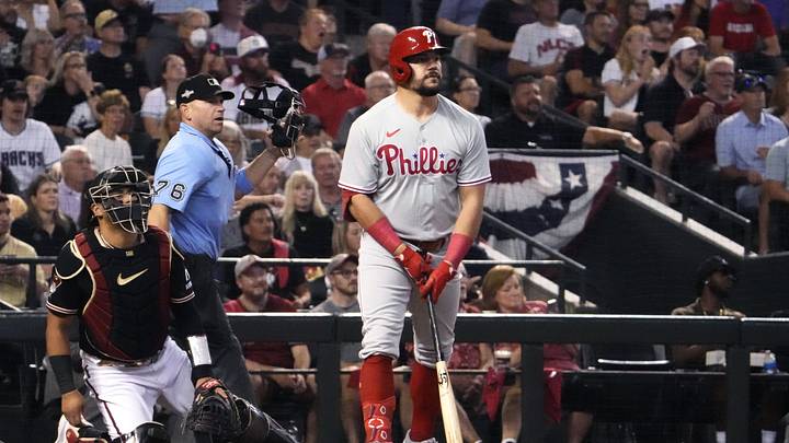 OPhiladelphia Phillies designated hitter Kyle Schwarber (12) hits a home run during the fourth inning against the Arizona Diamondbacks in game four of the NLCS of the 2023 MLB playoffs at Chase Field in Phoenix on Oct. 20, 2023. OPhiladelphia Phillies designated hitter Kyle Schwarber (12) hits a home run during the fourth inning against the Arizona Diamondbacks in game four of the NLCS of the 2023 MLB playoffs at Chase Field in Phoenix on Oct. 20, 2023.