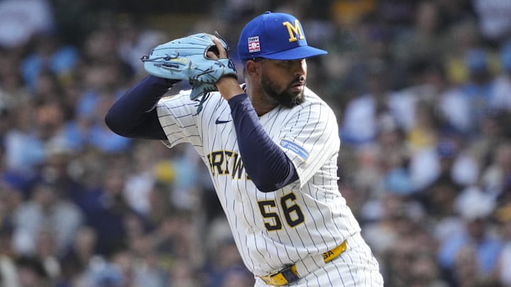 Jul 25, 2025; Milwaukee, Wisconsin, USA; Milwaukee Brewers pitcher Grant Anderson (56) prepares to deliver a pitch against the Miami Marlins in the eighth inning at American Family Field. Mandatory Credit: Michael McLoone-Imagn Images