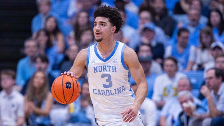 Mar 3, 2026; Chapel Hill, North Carolina, USA; North Carolina Tar Heels guard Derek Dixon (3) brings the ball up court against the Clemson Tigers during the second half at Dean E. Smith Center. Mandatory Credit: Scott Kinser-Imagn Images Mar 3, 2026; Chapel Hill, North Carolina, USA; North Carolina Tar Heels guard Derek Dixon (3) brings the ball up court against the Clemson Tigers during the second half at Dean E. Smith Center. Mandatory Credit: Scott Kinser-Imagn Images