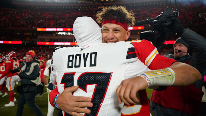 Jan 18, 2025; Kansas City, Missouri, USA; Kansas City Chiefs quarterback Patrick Mahomes (15) meets with Houston Texans cornerback Kris Boyd (17) after a 2025 AFC divisional round game at GEHA Field at Arrowhead Stadium. Mandatory Credit: Denny Medley-Imagn Images