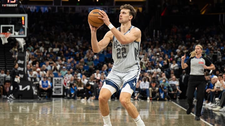 Mar 27, 2025; Orlando, Florida, USA; Orlando Magic forward Franz Wagner (22) shoots a three against the Dallas Mavericks in the fourth quarter at Kia Center. Mandatory Credit: Jeremy Reper-Imagn Images Mar 27, 2025; Orlando, Florida, USA; Orlando Magic forward Franz Wagner (22) shoots a three against the Dallas Mavericks in the fourth quarter at Kia Center. Mandatory Credit: Jeremy Reper-Imagn Images
