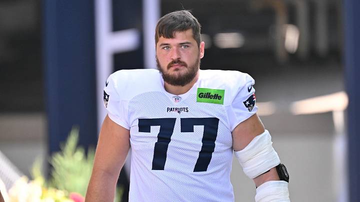 Jul 28, 2025; Foxborough, MA, USA; New England Patriots center Ben Brown (77) heads to the practice fields for training camp at Gillette Stadium. Mandatory Credit: Eric Canha-Imagn Images Jul 28, 2025; Foxborough, MA, USA; New England Patriots center Ben Brown (77) heads to the practice fields for training camp at Gillette Stadium. Mandatory Credit: Eric Canha-Imagn Images