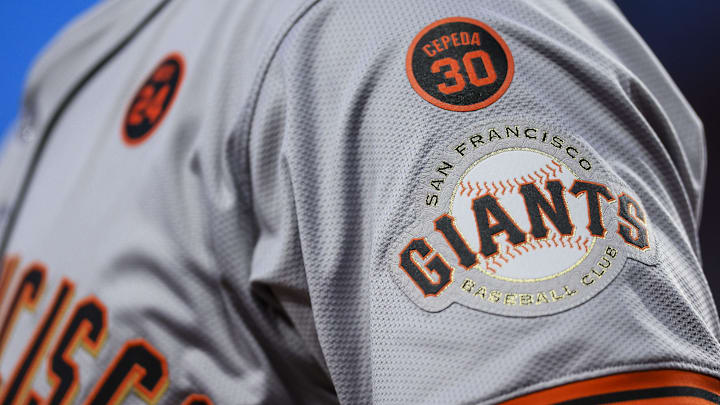 Aug 2, 2024; Cincinnati, Ohio, USA; A detail view of the San Francisco Giants logo on the sleeve of outfielder Michael Conforto (8) in the third inning in the game against the Cincinnati Reds at Great American Ball Park.
