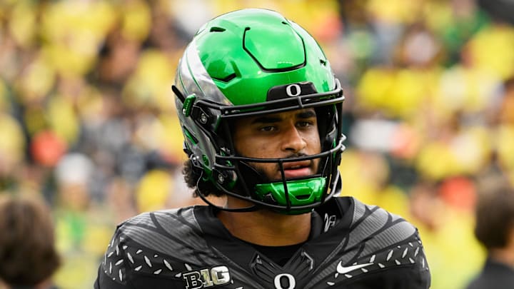 Oregon Ducks quarterback Dante Moore looks on during warmups before the game against the Indiana Hoosiers at Autzen Stadium.