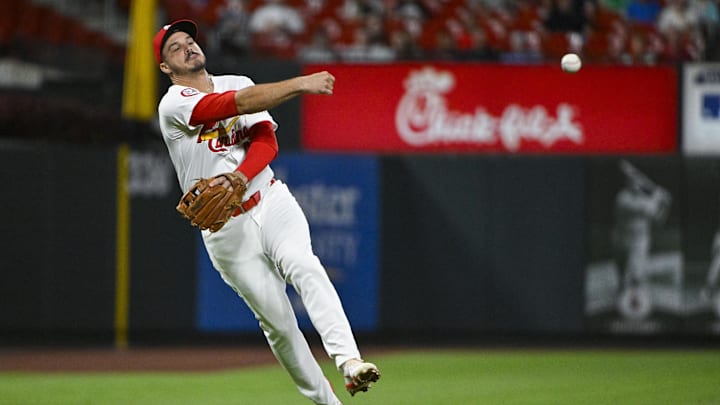 Aug 20, 2024; St. Louis, Missouri, USA;  St. Louis Cardinals third baseman Nolan Arenado (28) throws on the run against the Milwaukee Brewers during the seventh inning and at Busch Stadium. Mandatory Credit: Jeff Curry-Imagn Images