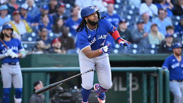 May 3, 2024; Washington, District of Columbia, USA; Toronto Blue Jays first baseman Vladimir Guerrero Jr. (27) watches the ball after a hit against the Washington Nationals during the first inning at Nationals Park. Mandatory Credit: Rafael Suanes-USA TODAY Sports May 3, 2024; Washington, District of Columbia, USA; Toronto Blue Jays first baseman Vladimir Guerrero Jr. (27) watches the ball after a hit against the Washington Nationals during the first inning at Nationals Park. Mandatory Credit: Rafael Suanes-USA TODAY Sports