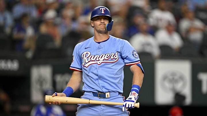Aug 24, 2025; Arlington, Texas, USA; Texas Rangers third baseman Josh Jung (6) reacts to striking out during the second inning against the Cleveland Guardians at Globe Life Field. Mandatory Credit: Jerome Miron-Imagn Images