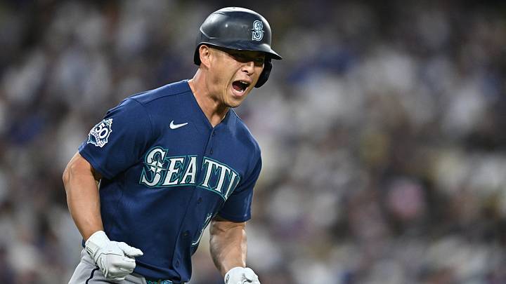 Jul 28, 2026; Los Angeles, California, USA; Seattle Mariners designated hitter Rob Refsnyder (30) reacts after hitting a two-run home run during the fourth inning against the Los Angeles Dodgers at Dodger Stadium. Mandatory Credit: William Liang-Imagn Images