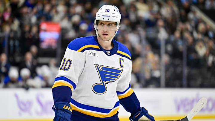 Jan 18, 2025; Salt Lake City, Utah, USA; St. Louis Blues center Brayden Schenn (10) before a face-off against the Utah Hockey Club during first period at the Delta Center. Mandatory Credit: Christopher Creveling-Imagn Images