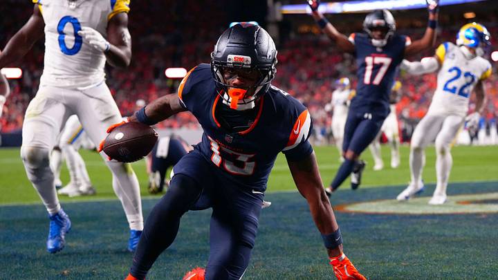 Sep 27, 2026; Denver, Colorado, USA;  Denver Broncos wide receiver Pat Bryant (13) scores a touchdown against the Los Angeles Rams during the second half at Empower Field at Mile High.  Mandatory Credit: Ron Chenoy-Imagn Images