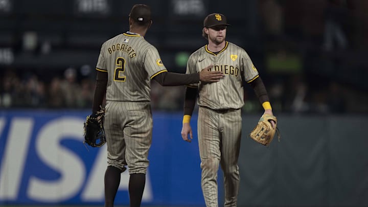 Sep 13, 2024; San Francisco, California, USA;  San Diego Padres second base Xander Bogaerts (2) congratulates first base Jake Cronenworth (9) after defeating the San Francisco Giants at Oracle Park. Mandatory Credit: Stan Szeto-Imagn Images