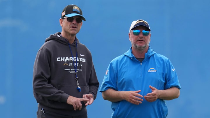 Los Angeles Chargers coach Jim Harbaugh and general manager Joe Hortiz watch during offseason workouts at The Bolt.