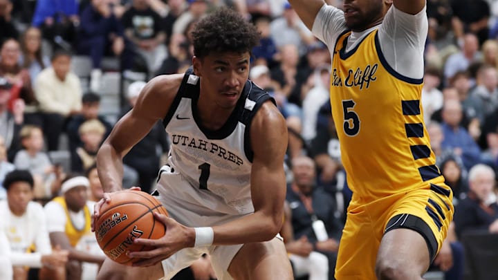 Jan 4, 2025; Gilbert, AZ, USA; Utah Prep Academy guard Anthony Felesi (1) against Oak Cliff Faith Family Academy (TX) guard Greg Lawson (5) during the Hoophall West High School Invitational at Highland High School. Mandatory Credit: Mark J. Rebilas-Imagn Images Jan 4, 2025; Gilbert, AZ, USA; Utah Prep Academy guard Anthony Felesi (1) against Oak Cliff Faith Family Academy (TX) guard Greg Lawson (5) during the Hoophall West High School Invitational at Highland High School. Mandatory Credit: Mark J. Rebilas-Imagn Images