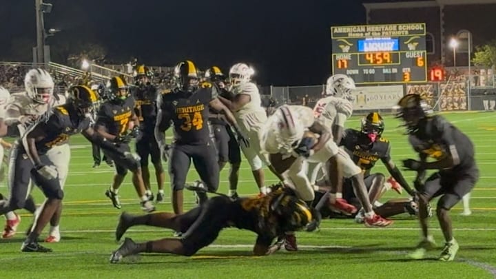 Derrek Cooper powers way into end zone for a touchdown in Chaminade-Madonna's 28-24 comeback win against American Heritage.