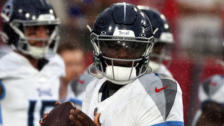 Aug 9, 2025; Tampa, Florida, USA; Tennessee Titians quarterback Cam Ward (1) works out prior to the game against the Tampa Bay Buccaneers at Raymond James Stadium. Mandatory Credit: Kim Klement Neitzel-Imagn Images