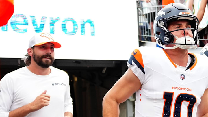 Aug 18, 2024; Denver, Colorado, USA; Denver Broncos quarterback Bo Nix (10) and quarterback Jarrett Stidham (8) before the preseason game against the Green Bay Packers at Empower Field at Mile High. Aug 18, 2024; Denver, Colorado, USA; Denver Broncos quarterback Bo Nix (10) and quarterback Jarrett Stidham (8) before the preseason game against the Green Bay Packers at Empower Field at Mile High.