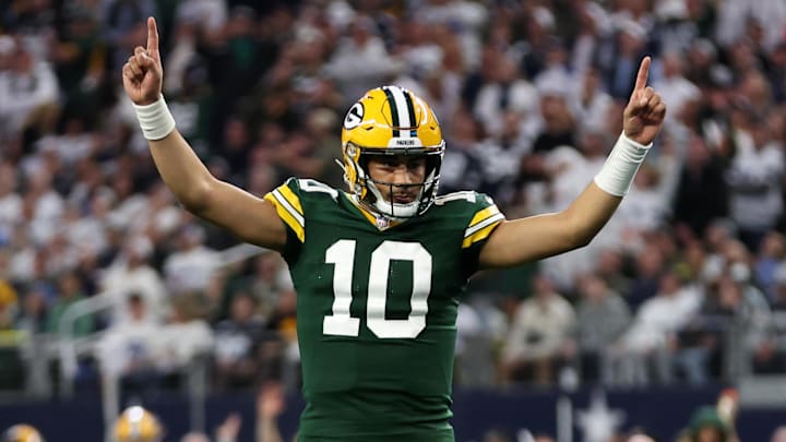 Jan 14, 2024; Arlington, Texas, USA; Green Bay Packers quarterback Jordan Love (10) reacts after a touchdown against the Dallas Cowboys in the first quarter for the 2024 NFC wild card game at AT&T Stadium. Mandatory Credit: Tim Heitman-Imagn Images