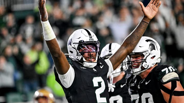 Michigan State's Aidan Chiles celebrates his rushing touchdown against Boston College during the second overtime on Saturday, Sept. 6, 2025, at Spartan Stadium in East Lansing.