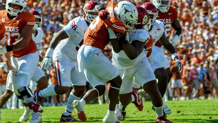 Oklahoma defensive tackle David Stone makes a stop vs. Texas last season. Stone figures to be a big key in helping the Sooners slow down the Longhorns' running game Saturday.