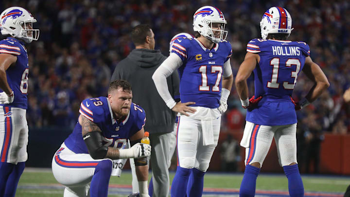 Bills Josh Allen chats with Mack Hollins. Bills Josh Allen chats with Mack Hollins.