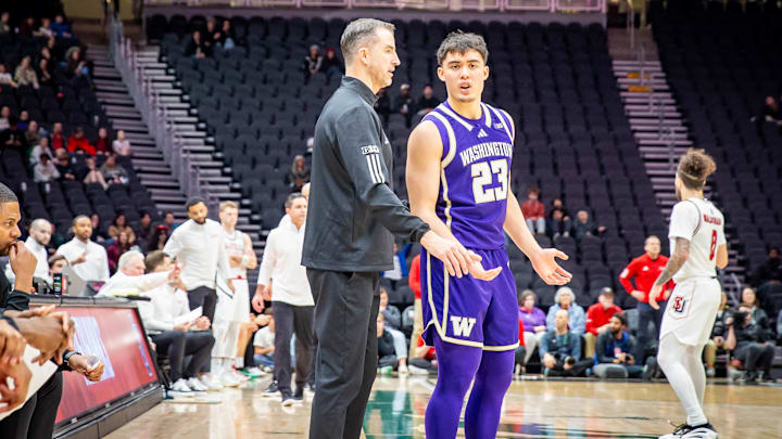 Danny Sprinkle and JJ Mandaquit confer during the Seattle U game. 