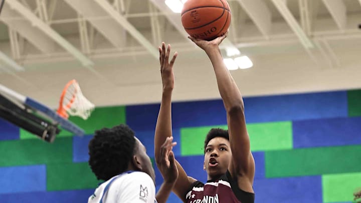 Lebanon forward Anthony Thompson (5) shoots the ball during their during their 50-61 loss to Winton Woods Friday, Jan. 5, 2024.