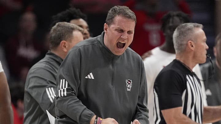 Mar 11, 2026; Charlotte, NC, USA; NC State Wolfpack head coach Will Wade reacts to a score during the second half against the Pittsburgh Panthers at Spectrum Center. Mandatory Credit: Jim Dedmon-Imagn Images Mar 11, 2026; Charlotte, NC, USA; NC State Wolfpack head coach Will Wade reacts to a score during the second half against the Pittsburgh Panthers at Spectrum Center. Mandatory Credit: Jim Dedmon-Imagn Images
