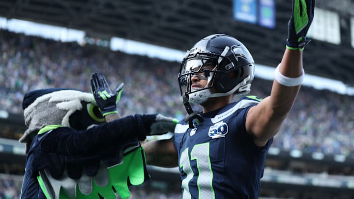 Nov 9, 2025; Seattle, Washington, USA; Seattle Seahawks wide receiver Jaxon Smith-Njigba (11) celebrates after scoring a touchdown during the first quarter against the Arizona Cardinals at Lumen Field. Nov 9, 2025; Seattle, Washington, USA; Seattle Seahawks wide receiver Jaxon Smith-Njigba (11) celebrates after scoring a touchdown during the first quarter against the Arizona Cardinals at Lumen Field.