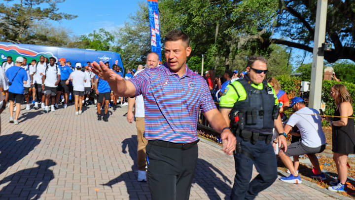 Florida Head Coach Jon Sumrall greats fans as he heads to the locker room during Gator Walk before the Orange and Blue game at Steve Spurrier Field at Ben Hill Griffin Stadium in Gainesville, FL on Saturday, April 11, 2026. [Alan Youngblood/Gainesville Sun]