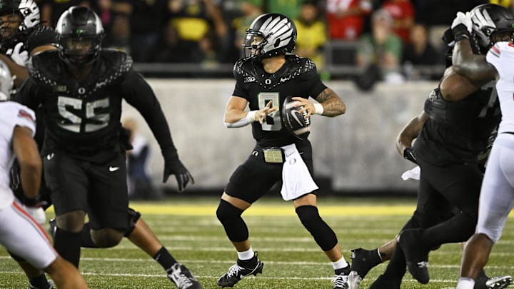 Oct 12, 2024; Eugene, Oregon, USA; Oregon Ducks quarterback Dillon Gabriel (8) throws a pass during the second half against the Ohio State Buckeyes at Autzen Stadium. Mandatory Credit: Troy Wayrynen-Imagn Images
