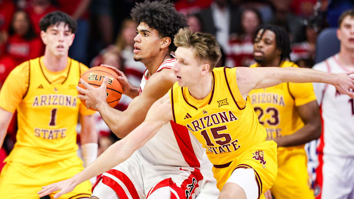 Jan 14, 2026; Tucson, Arizona, USA; Arizona Wildcats forward Koa Peat (10) looks to pass the ball during the first half of the game against the Arizona State Sun Devils at McKale Memorial Center. Mandatory Credit: Aryanna Frank-Imagn Images