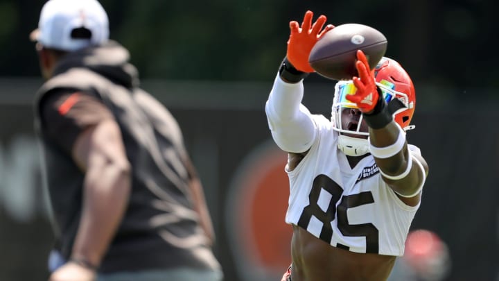 Browns tight end David Njoku reaches for a pass during minicamp, Thursday, June 13, 2024, in Berea.