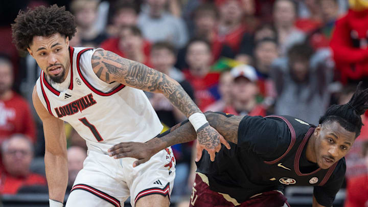 Louisville’s J'Vonne Hadley fights for the ball against a Florida State defender during a game at the YUM Center. Feb. 22, 2025 Louisville’s J'Vonne Hadley fights for the ball against a Florida State defender during a game at the YUM Center. Feb. 22, 2025
