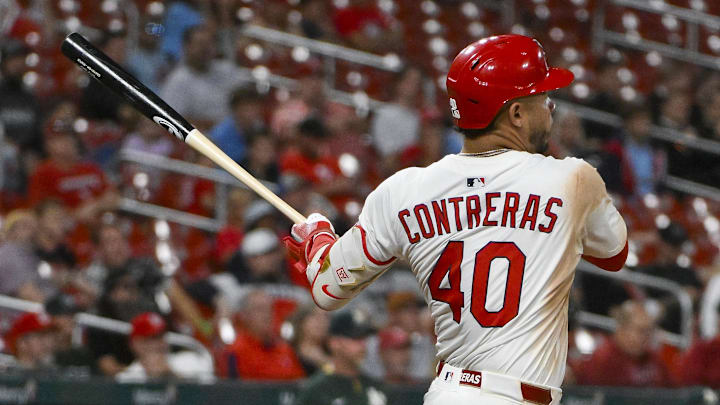 Sep 3, 2025; St. Louis, Missouri, USA;  St. Louis Cardinals first baseman Willson Contreras (40) hits a two run triple against the Athletics during the eighth inning at Busch Stadium. Mandatory Credit: Jeff Curry-Imagn Images