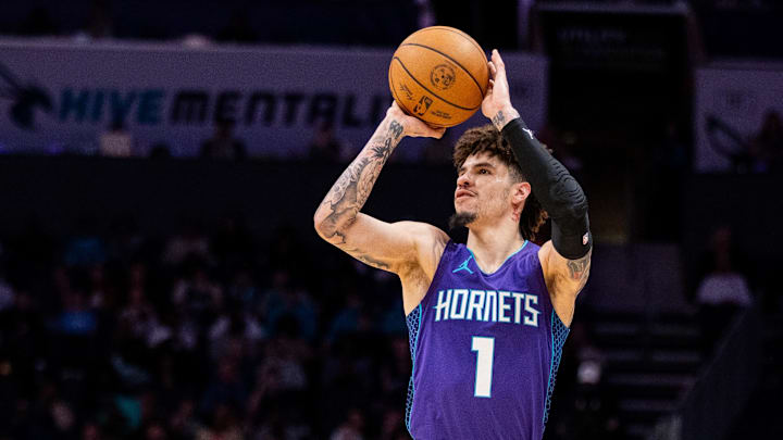 Mar 1, 2025; Charlotte, North Carolina, USA; Charlotte Hornets guard LaMelo Ball (1) attempts a three-point shot against the Washington Wizards during the second quarter at Spectrum Center. Mandatory Credit: Scott Kinser-Imagn Images