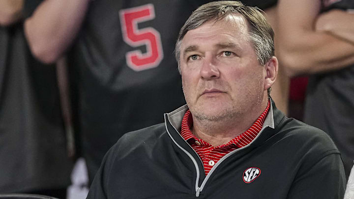 Feb 25, 2025; Athens, Georgia, USA; Georgia Bulldogs head football coach Kirby Smart watches the basketball game between Georgia and the Florida Gators during the second half at Stegeman Coliseum. Mandatory Credit: Dale Zanine-Imagn Images