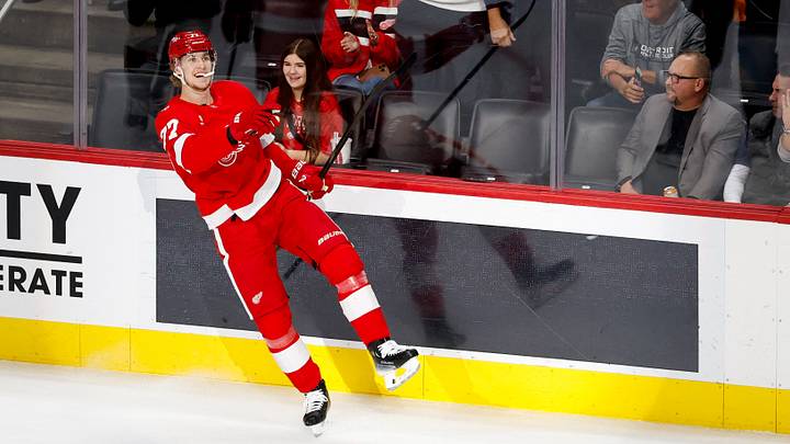 Mar 4, 2026; Detroit, Michigan, USA;  Detroit Red Wings defenseman Simon Edvinsson (77) celebrates after scoring in the first period against the Vegas Golden Knights at Little Caesars Arena. Mandatory Credit: Rick Osentoski-Imagn Images