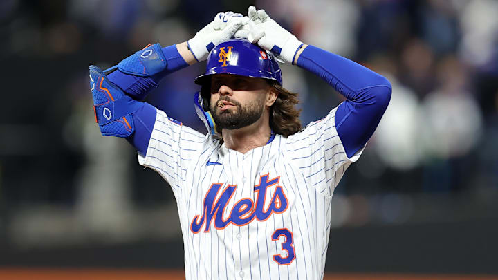 New York Mets outfielder Jesse Winker (3) reacts New York Mets outfielder Jesse Winker (3) reacts