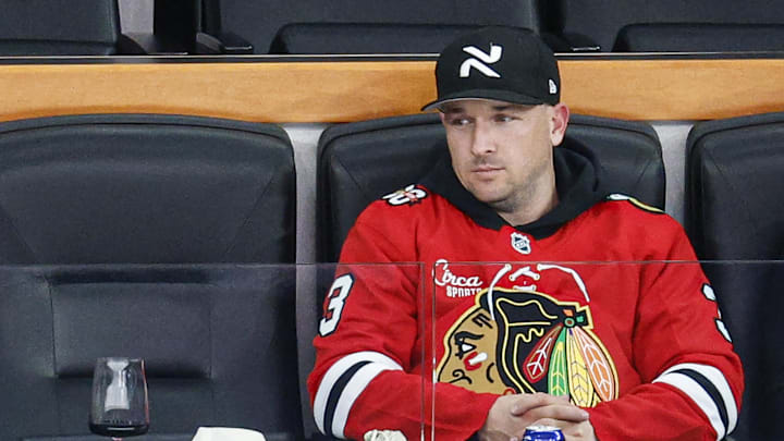 Jan 12, 2026; Chicago, Illinois, USA; Chicago Cubs third baseman Alex Bregman watches an NHL game between the Chicago Blackhawks and Edmonton Oilers during the third period at United Center. Mandatory Credit: Kamil Krzaczynski-Imagn Images