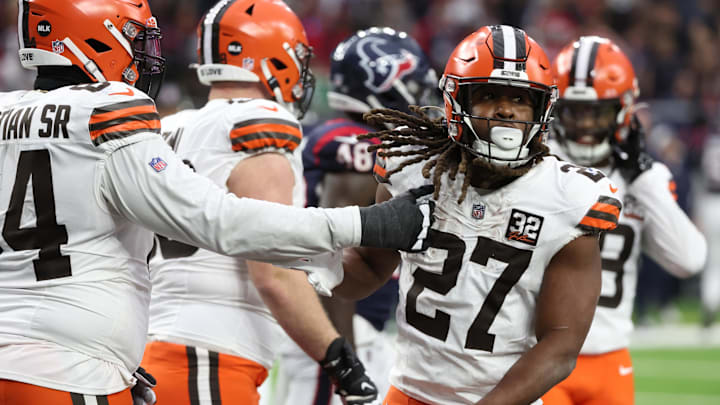 Jan 13, 2024; Houston, Texas, USA;Cleveland Browns running back Kareem Hunt (27) celebrates his touchdown against the Houston Texans  in a 2024 AFC wild card game at NRG Stadium. Mandatory Credit: Thomas Shea-Imagn Images