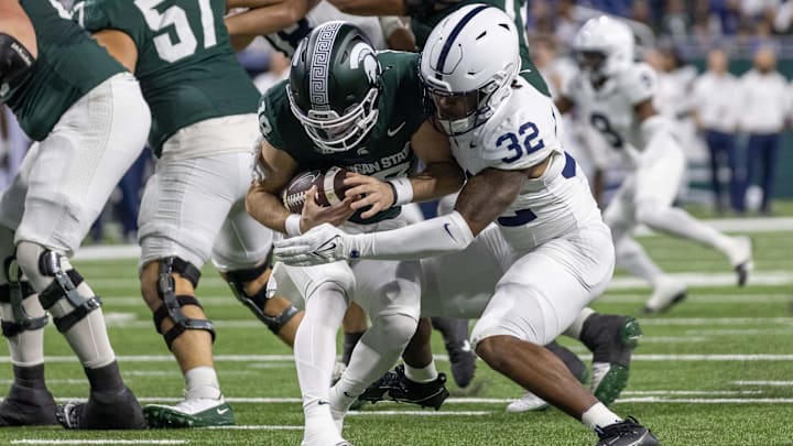 Nov 24, 2023; Detroit, Michigan, USA; Penn State Nittany Lions linebacker Keon Wylie (32) sacks Michigan State Spartans quarterback Katin Houser (12) during the second half at Ford Field. Mandatory Credit: David Reginek-Imagn Images Nov 24, 2023; Detroit, Michigan, USA; Penn State Nittany Lions linebacker Keon Wylie (32) sacks Michigan State Spartans quarterback Katin Houser (12) during the second half at Ford Field. Mandatory Credit: David Reginek-Imagn Images