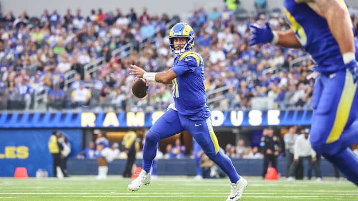 Jan 5, 2025; Inglewood, California, USA;  Los Angeles Rams Quarterback Jimmy Garoppolo runs down the field for an attempted throw in Week 18 versus the Seattle Seahawks at SoFi Stadium. Mandatory Credit: William Navarro-Imagn Images