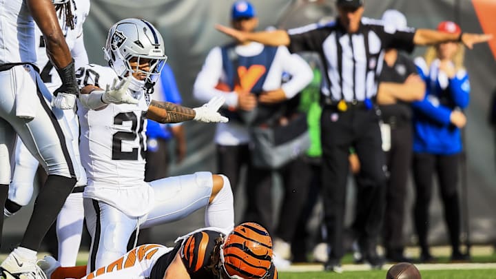 Nov 3, 2024; Cincinnati, Ohio, USA; Las Vegas Raiders safety Isaiah Pola-Mao (20) reacts after breaking up a pass intended for Cincinnati Bengals wide receiver Trenton Irwin (16) in the first half at Paycor Stadium. Mandatory Credit: Katie Stratman-Imagn Images