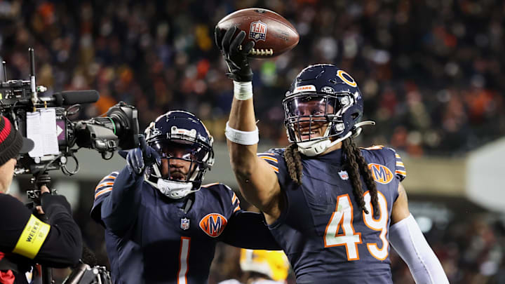 Dec 20, 2025; Chicago, Illinois, USA; Chicago Bears linebacker Tremaine Edmunds (49) poses for a television camera with cornerback Jaylon Johnson (1) after recovering a fumble against the Green Bay Packers during the third quarter at Soldier Field. Mandatory Credit: Mike Dinovo-Imagn Images Dec 20, 2025; Chicago, Illinois, USA; Chicago Bears linebacker Tremaine Edmunds (49) poses for a television camera with cornerback Jaylon Johnson (1) after recovering a fumble against the Green Bay Packers during the third quarter at Soldier Field. Mandatory Credit: Mike Dinovo-Imagn Images